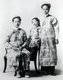 Malaysia / Singapore: Two young Nyonya women with a girl child, c. 1940s