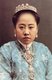 Malaysia / Singapore: Hand-coloured photograph of a Penang Nyonya woman wearing Straits Chinese jewellery, early 20th century